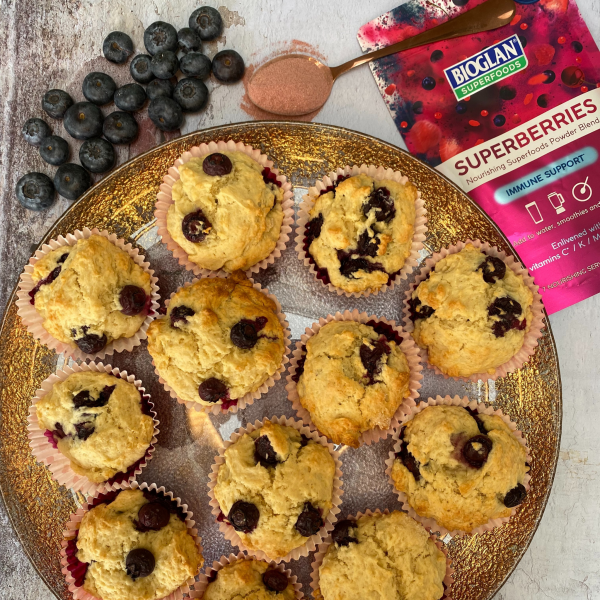 Plate Vegan Blueberry Muffins with Bioglan Superfoods Superberries, decorated with blueberries